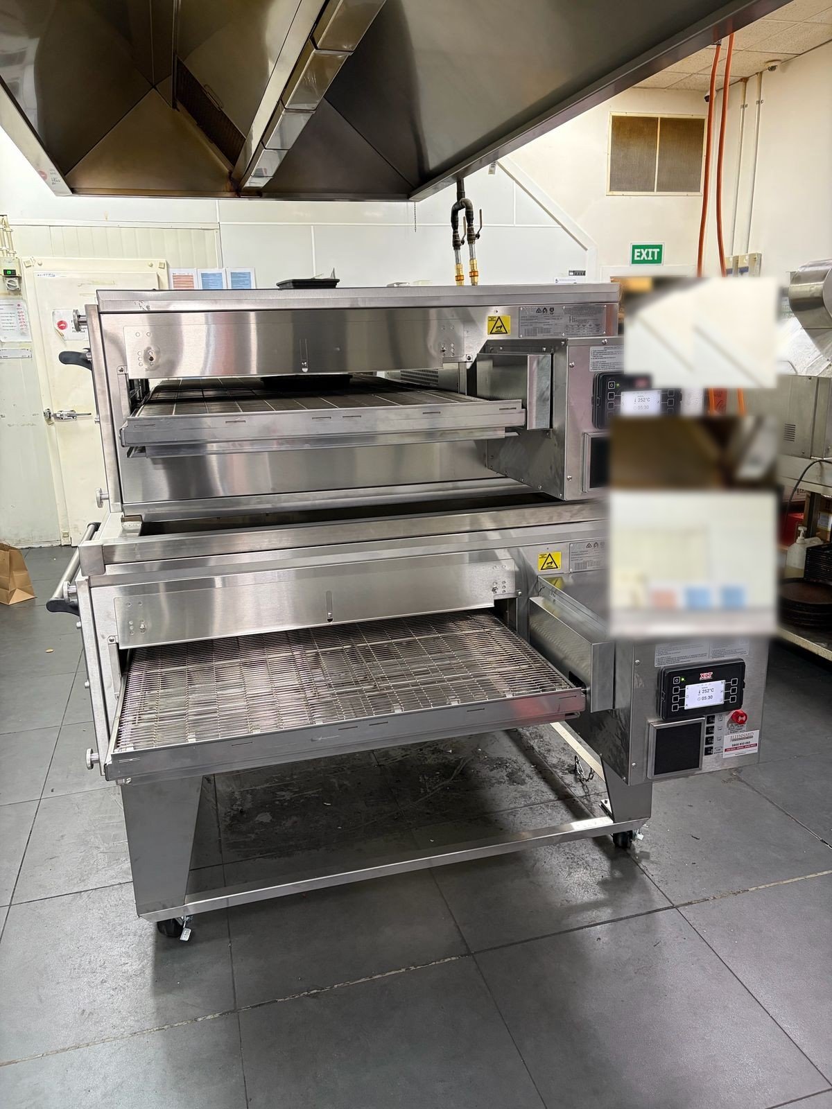 Two new stacked XLT gas conveyor ovens with digital controls installed at a Petone pizza shop by CES Wellington