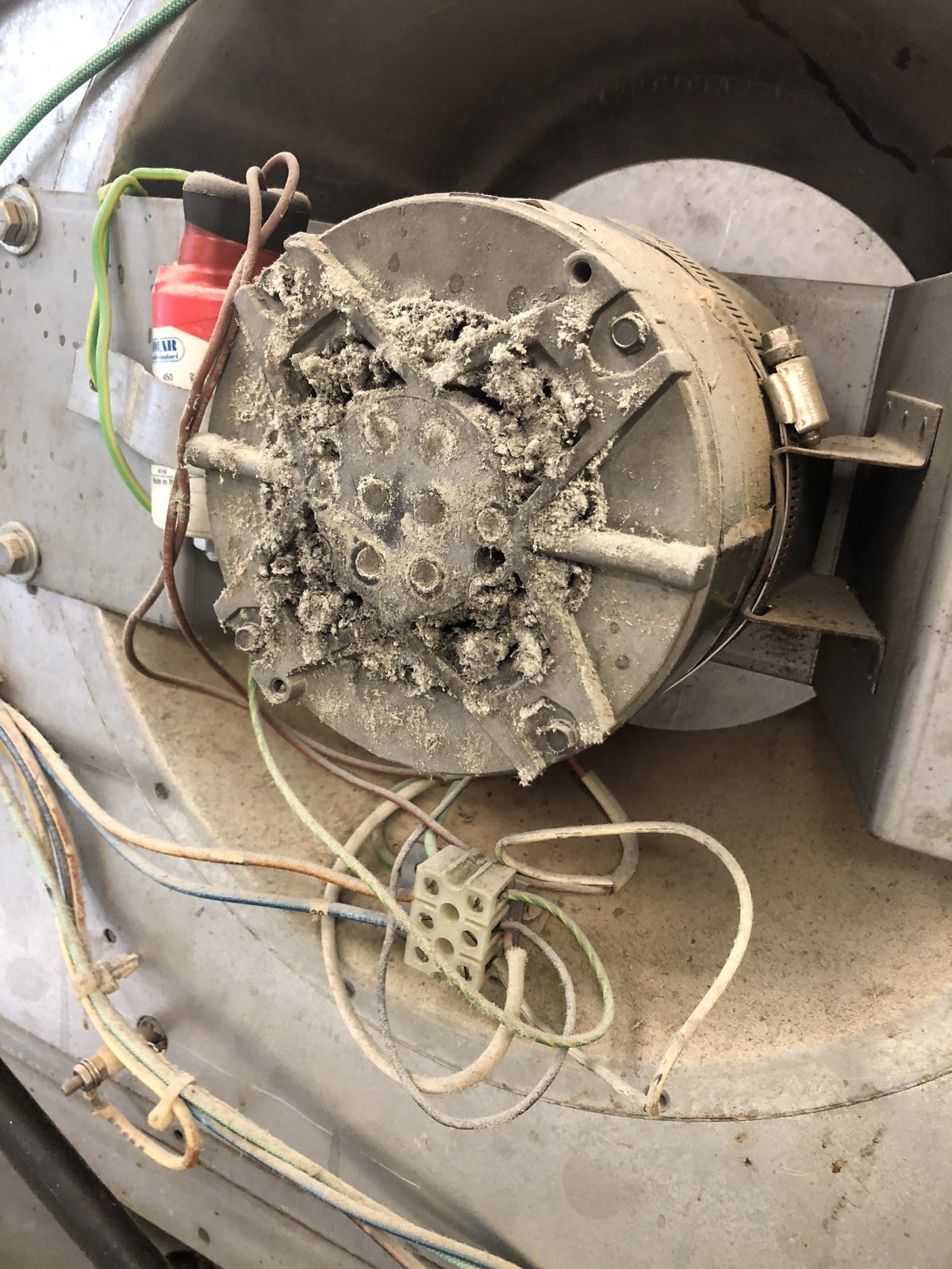 Oven fan motor clogged with dust, found during a service